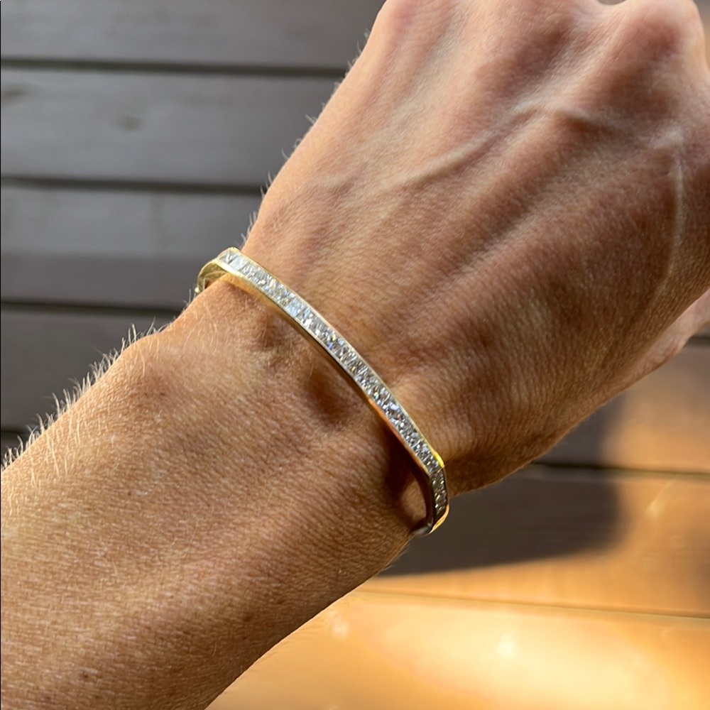 Gorgeous vintage channel set princess cut diamond and 14K gold bangle